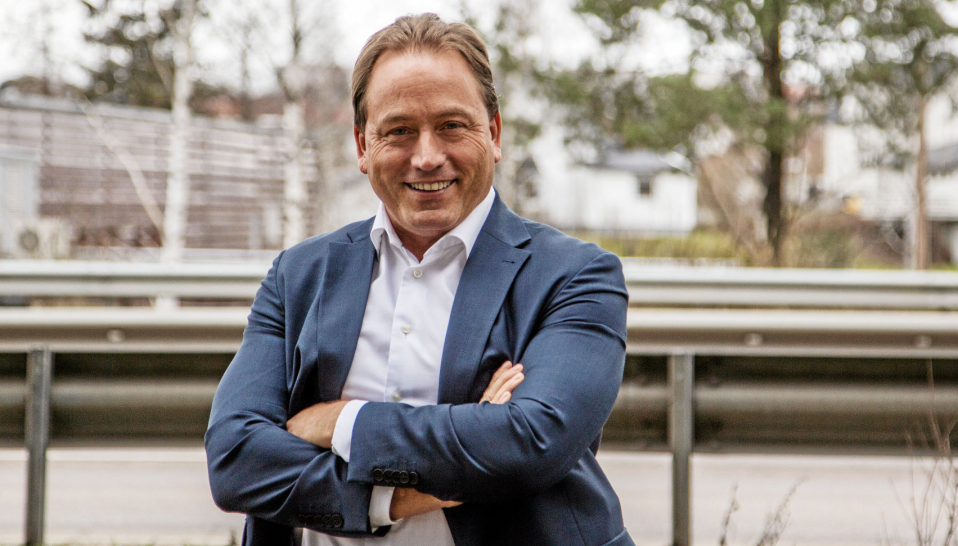 KAN SMILE: Administrerende direktør i PostNord, Robin Olsen.