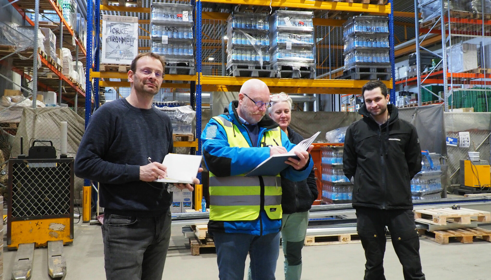 Fra venstre: Børge B. Hestdahl, Ronny Strømnes, Anna-Karin Lind og Christian Simon har samarbeidet om oppgraderingen av lageret Coop Svalbard SA.